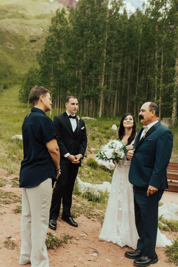 maroon bells wedding photos, maroon bells elopement, mountain elopement inspiration, aspen wedding, wedding ceremony photos, mountain wedding inspiration, elopement inspiration, colorado wedding, wedding photographer, aspen wedding photographer, aspen wedding photos, aspen wedding photos, maroon bells elopement photos, maroon bells amphitheater wedding photos, bride and groom photos, wedding dress inspo, destination wedding photographer, elopement photographer