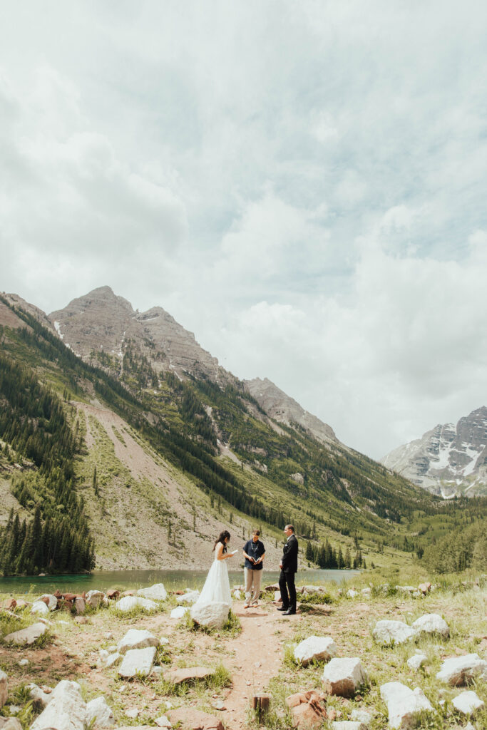 maroon bells wedding photos, maroon bells elopement, mountain elopement inspiration, aspen wedding, wedding ceremony photos, mountain wedding inspiration, elopement inspiration, colorado wedding, wedding photographer, aspen wedding photographer, aspen wedding photos, aspen wedding photos, maroon bells elopement photos, maroon bells amphitheater wedding photos, bride and groom photos, wedding dress inspo, destination wedding photographer, elopement photographer