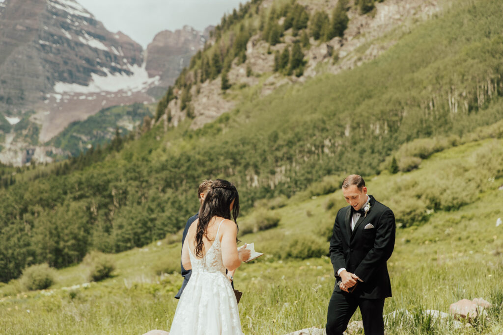 maroon bells wedding photos, maroon bells elopement, mountain elopement inspiration, aspen wedding, wedding ceremony photos, mountain wedding inspiration, elopement inspiration, colorado wedding, wedding photographer, aspen wedding photographer, aspen wedding photos, aspen wedding photos, maroon bells elopement photos, maroon bells amphitheater wedding photos, bride and groom photos, wedding dress inspo, destination wedding photographer, elopement photographer