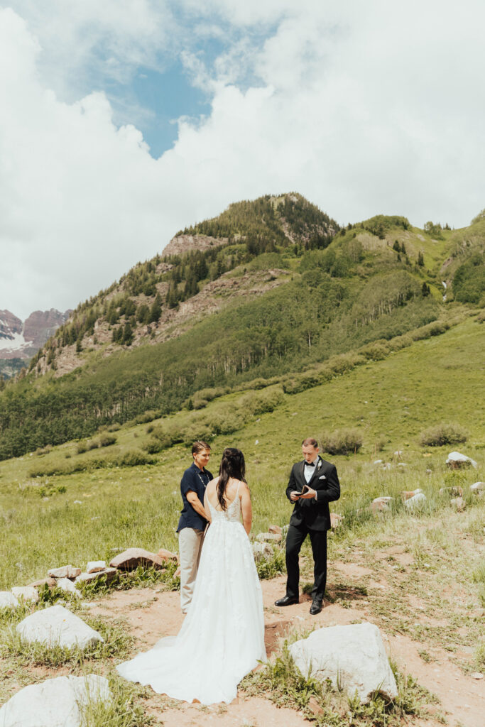 maroon bells wedding photos, maroon bells elopement, mountain elopement inspiration, aspen wedding, wedding ceremony photos, mountain wedding inspiration, elopement inspiration, colorado wedding, wedding photographer, aspen wedding photographer, aspen wedding photos, aspen wedding photos, maroon bells elopement photos, maroon bells amphitheater wedding photos, bride and groom photos, wedding dress inspo, destination wedding photographer, elopement photographer