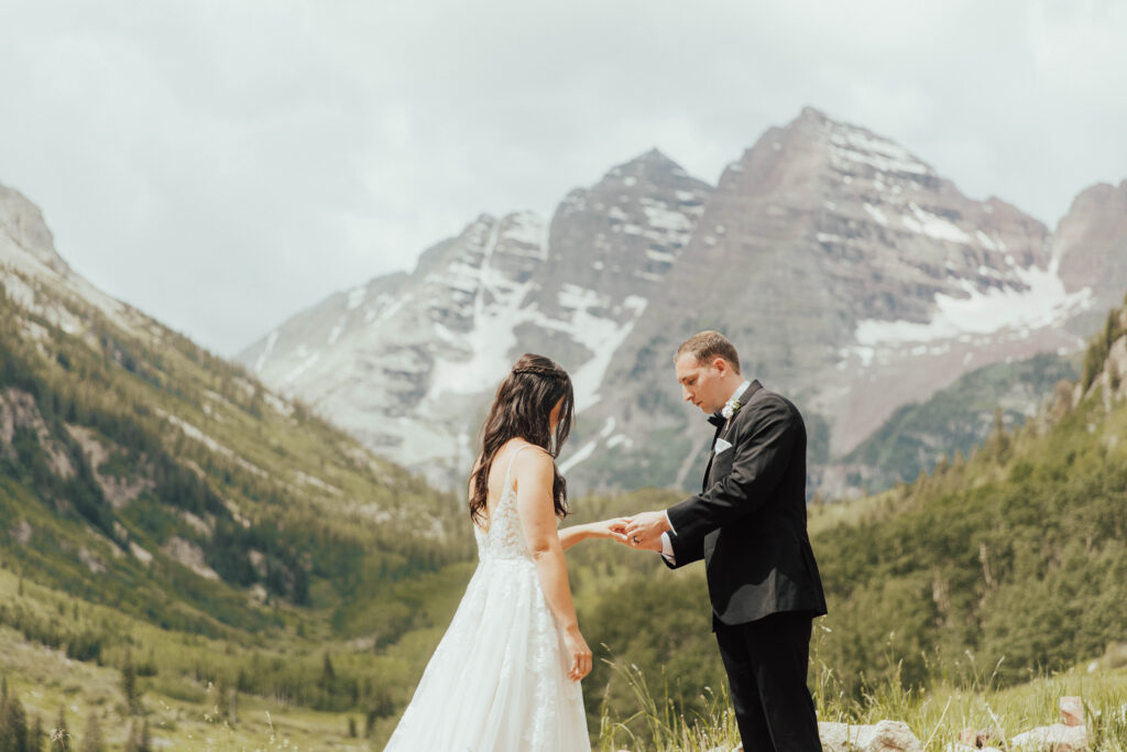 maroon bells wedding photos, maroon bells elopement, mountain elopement inspiration, aspen wedding, wedding ceremony photos, mountain wedding inspiration, elopement inspiration, colorado wedding, wedding photographer, aspen wedding photographer, aspen wedding photos, aspen wedding photos, maroon bells elopement photos, maroon bells amphitheater wedding photos, bride and groom photos, wedding dress inspo, destination wedding photographer, elopement photographer