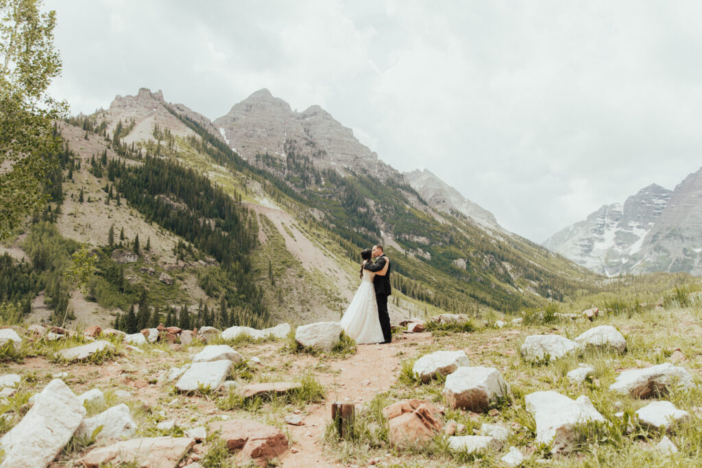 maroon bells wedding photos, maroon bells elopement, mountain elopement inspiration, aspen wedding, wedding ceremony photos, mountain wedding inspiration, elopement inspiration, colorado wedding, wedding photographer, aspen wedding photographer, aspen wedding photos, aspen wedding photos, maroon bells elopement photos, maroon bells amphitheater wedding photos, bride and groom photos, wedding dress inspo, destination wedding photographer, elopement photographer