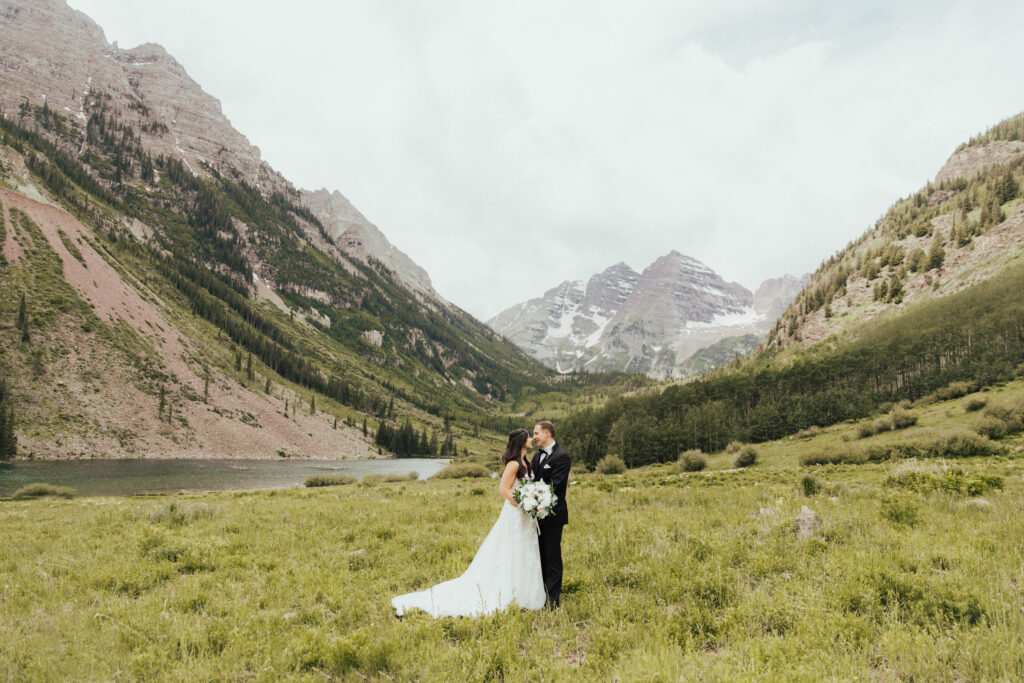 maroon bells wedding photos, maroon bells elopement, mountain elopement inspiration, aspen wedding, wedding ceremony photos, mountain wedding inspiration, elopement inspiration, colorado wedding, wedding photographer, aspen wedding photographer, aspen wedding photos, aspen wedding photos, maroon bells elopement photos, maroon bells amphitheater wedding photos, bride and groom photos, wedding dress inspo, destination wedding photographer, elopement photographer