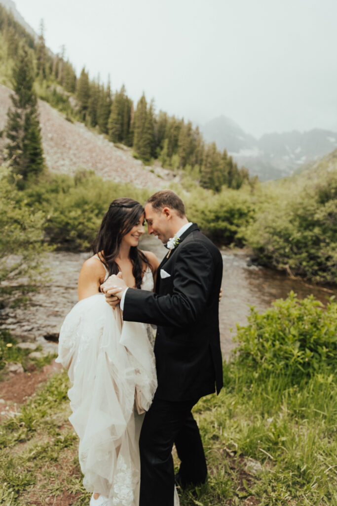 maroon bells wedding photos, maroon bells elopement, mountain elopement inspiration, aspen wedding, wedding ceremony photos, mountain wedding inspiration, elopement inspiration, colorado wedding, wedding photographer, aspen wedding photographer, aspen wedding photos, aspen wedding photos, maroon bells elopement photos, maroon bells amphitheater wedding photos, bride and groom photos, wedding dress inspo, destination wedding photographer, elopement photographer