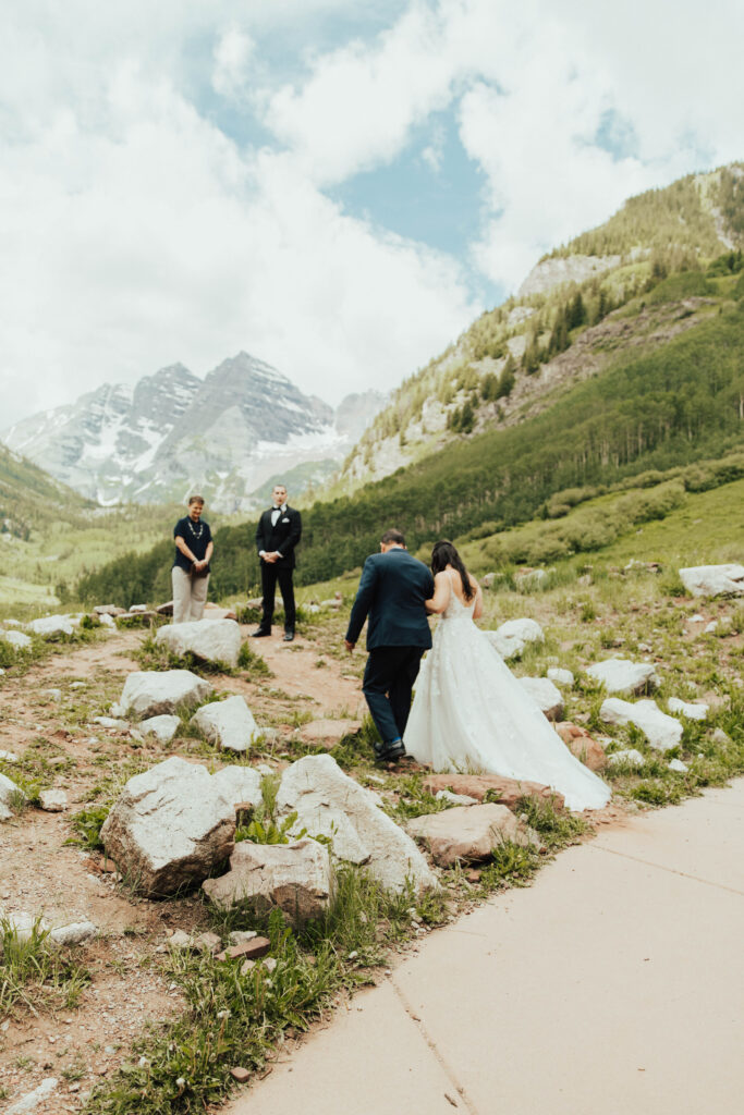 maroon bells wedding photos, maroon bells elopement, mountain elopement inspiration, aspen wedding, wedding ceremony photos, mountain wedding inspiration, elopement inspiration, colorado wedding, wedding photographer, aspen wedding photographer, aspen wedding photos, aspen wedding photos, maroon bells elopement photos, maroon bells amphitheater wedding photos, bride and groom photos, wedding dress inspo, destination wedding photographer, elopement photographer