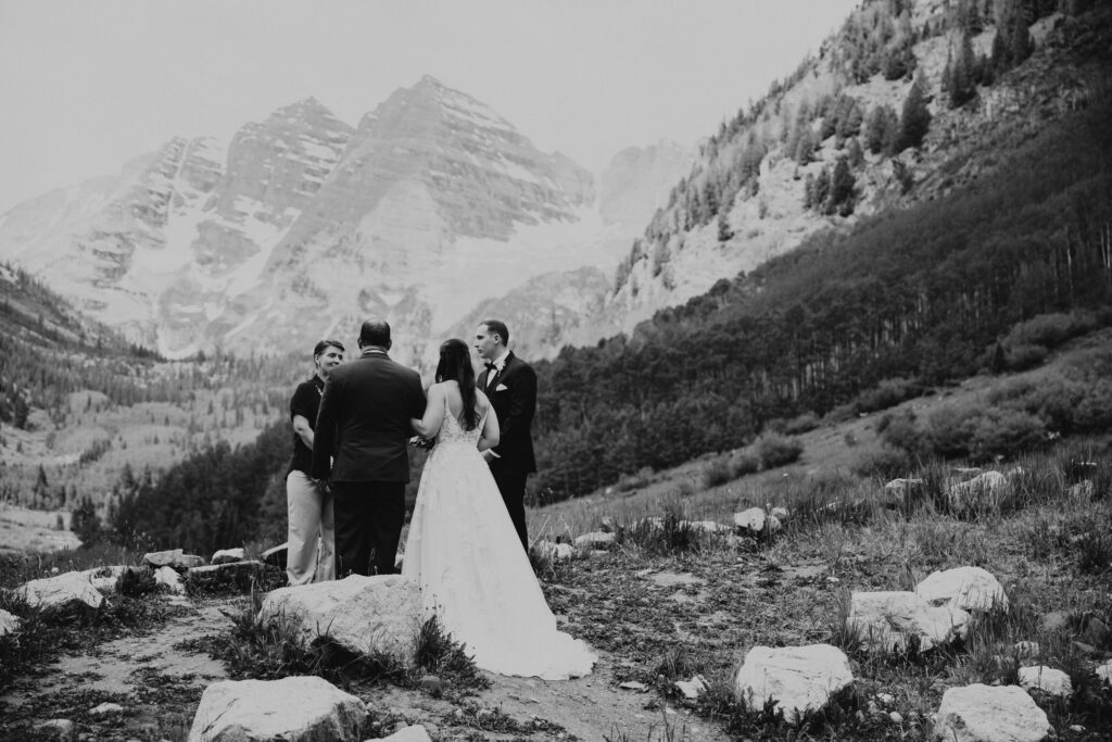 maroon bells wedding photos, maroon bells elopement, mountain elopement inspiration, aspen wedding, wedding ceremony photos, mountain wedding inspiration, elopement inspiration, colorado wedding, wedding photographer, aspen wedding photographer, aspen wedding photos, aspen wedding photos, maroon bells elopement photos, maroon bells amphitheater wedding photos, bride and groom photos, wedding dress inspo, destination wedding photographer, elopement photographer