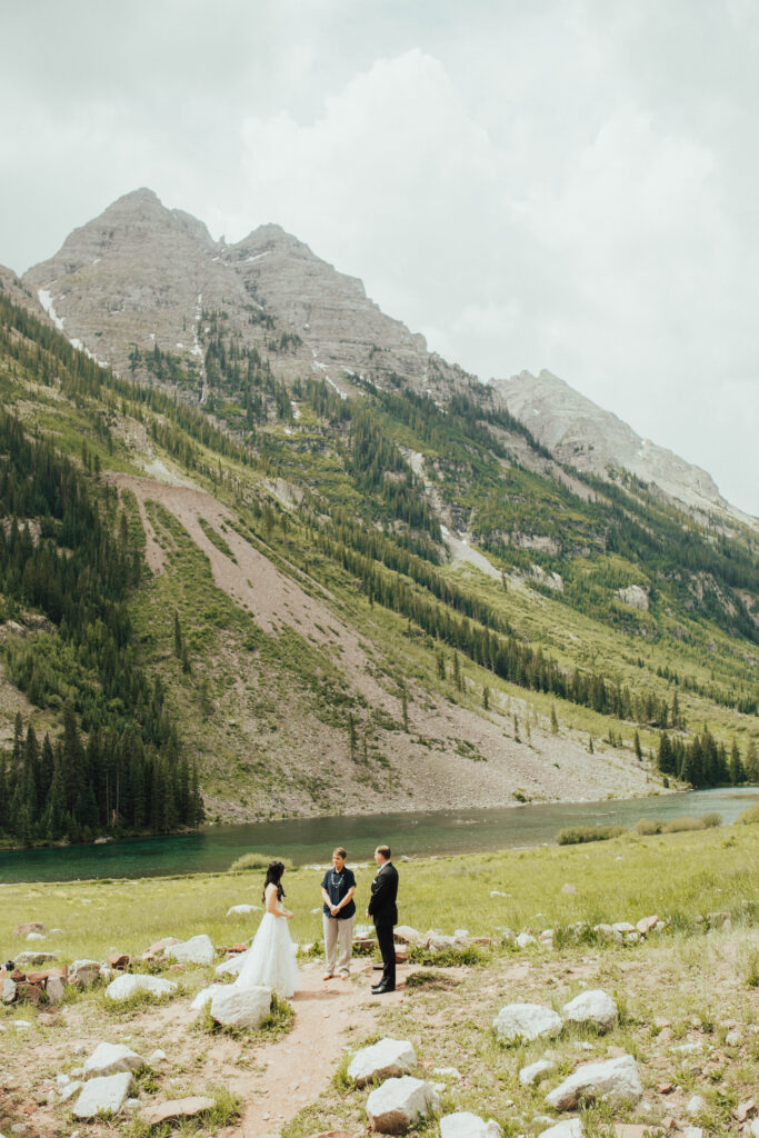 maroon bells wedding photos, maroon bells elopement, mountain elopement inspiration, aspen wedding, wedding ceremony photos, mountain wedding inspiration, elopement inspiration, colorado wedding, wedding photographer, aspen wedding photographer, aspen wedding photos, aspen wedding photos, maroon bells elopement photos, maroon bells amphitheater wedding photos, bride and groom photos, wedding dress inspo, destination wedding photographer, elopement photographer