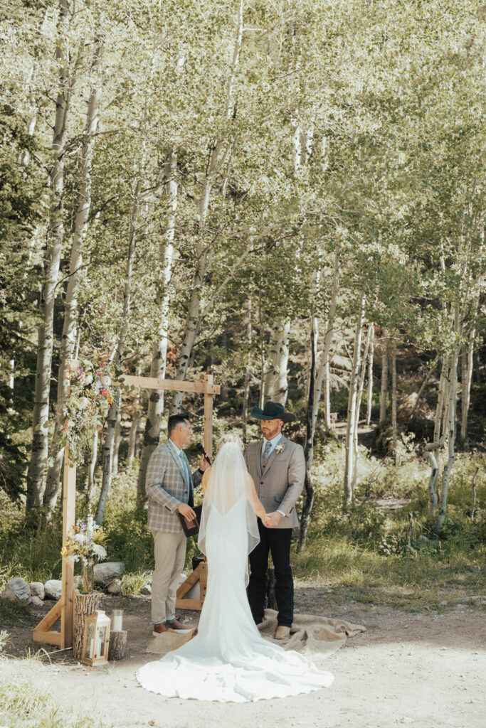 luxury mountain wedding photographer, intimate wedding venue, colorful wedding, wildflower wedding floral arrangements, western luxe groom inspiration, destination wedding photographer, timeless mountain wedding photos, couture wedding gown inspiration, elegant outdoor wedding ceremony, intimate mountain wedding ceremony
