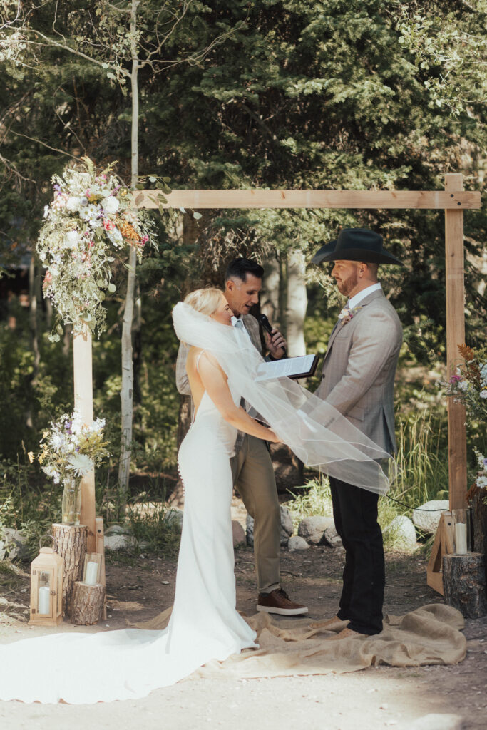 luxury mountain wedding photographer, intimate wedding venue, colorful wedding, wildflower wedding floral arrangements, western luxe groom inspiration, destination wedding photographer, timeless mountain wedding photos, couture wedding gown inspiration, elegant outdoor wedding ceremony, intimate mountain wedding ceremony