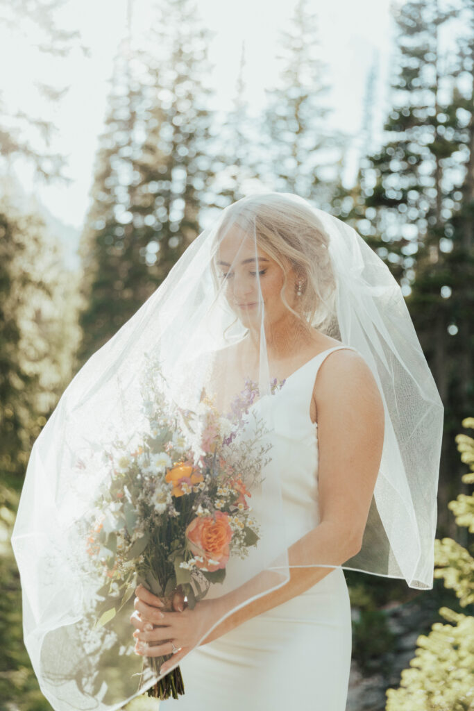 luxury mountain wedding photographer, intimate wedding venue, colorful wedding, wildflower wedding floral arrangements, western luxe groom inspiration, destination wedding photographer, timeless mountain wedding photos, couture wedding gown inspiration, elegant outdoor wedding ceremony, intimate mountain wedding ceremony