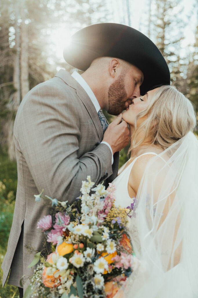 luxury mountain wedding photographer, intimate wedding venue, colorful wedding, wildflower wedding floral arrangements, western luxe groom inspiration, destination wedding photographer, timeless mountain wedding photos, couture wedding gown inspiration, elegant outdoor wedding ceremony, intimate mountain wedding ceremony, alta lodge wedding photos