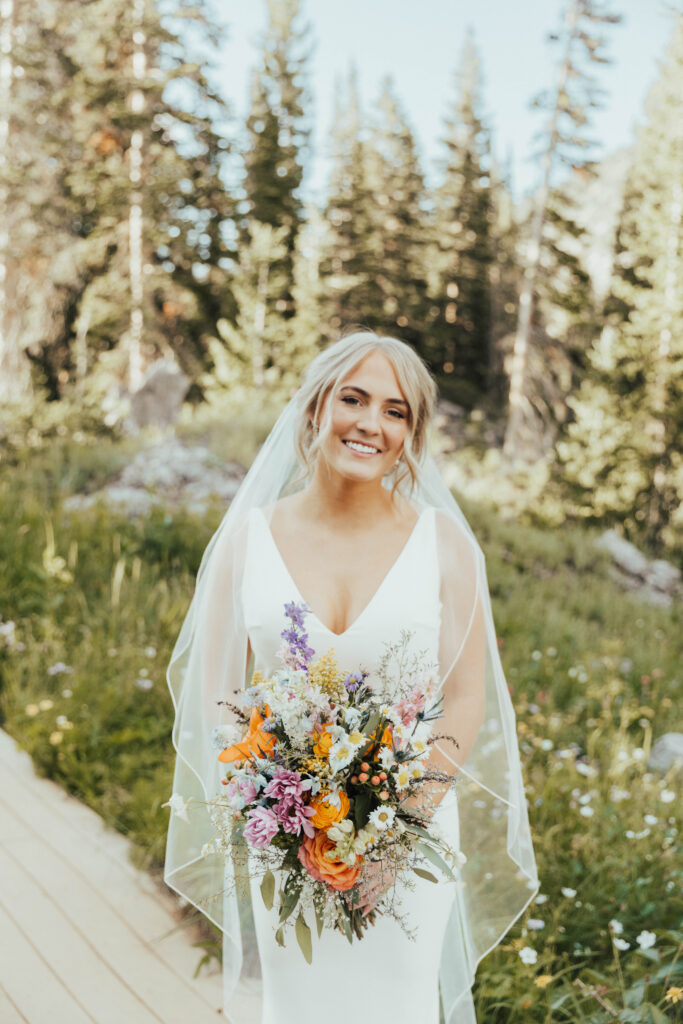 luxury mountain wedding photographer, intimate wedding venue, colorful wedding, wildflower wedding floral arrangements, western luxe groom inspiration, destination wedding photographer, timeless mountain wedding photos, couture wedding gown inspiration, elegant outdoor wedding ceremony, intimate mountain wedding ceremony