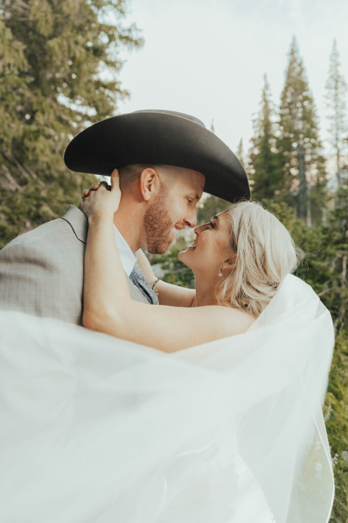 luxury mountain wedding photographer, intimate wedding venue, colorful wedding, wildflower wedding floral arrangements, western luxe groom inspiration, destination wedding photographer, timeless mountain wedding photos, couture wedding gown inspiration, elegant outdoor wedding ceremony, intimate mountain wedding ceremony