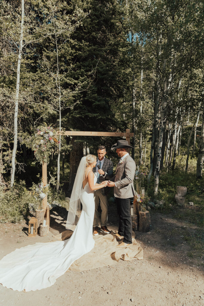 luxury mountain wedding photographer, intimate wedding venue, colorful wedding, wildflower wedding floral arrangements, western luxe groom inspiration, destination wedding photographer, timeless mountain wedding photos, couture wedding gown inspiration, elegant outdoor wedding ceremony, intimate mountain wedding ceremony