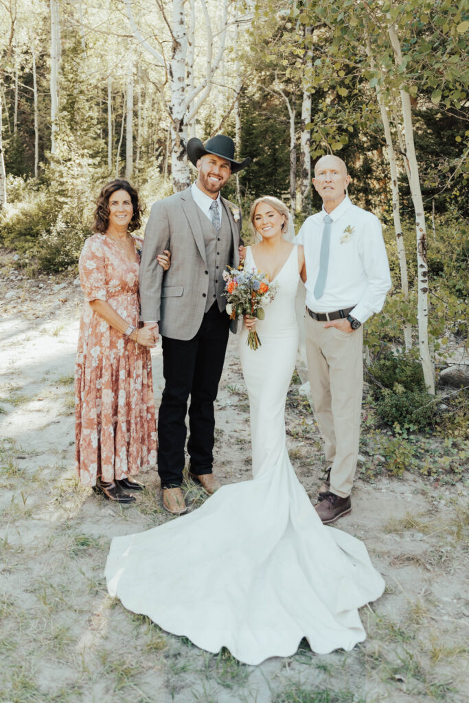 mountain elopement, adventurous destination wedding photography, national park wedding photographer, yosemite wedding photographer, maroon bells amphitheater elopement photographer, adventure elopement in the rockies, glacier national park elopement photographer, canmore mountain wedding photographer, colorado mountain wedding photographer, grand teton national park wedding photographer, luxury mountain wedding photographer, intimate wedding venue, colorful wedding, wildflower wedding floral arrangements, western luxe groom inspiration, destination wedding photographer, timeless mountain wedding photos, couture wedding gown inspiration, elegant outdoor wedding ceremony, intimate mountain wedding ceremony