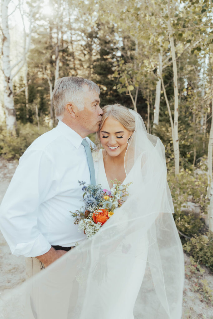 luxury mountain wedding photographer, intimate wedding venue, colorful wedding, wildflower wedding floral arrangements, western luxe groom inspiration, destination wedding photographer, timeless mountain wedding photos, couture wedding gown inspiration, elegant outdoor wedding ceremony, intimate mountain wedding ceremony