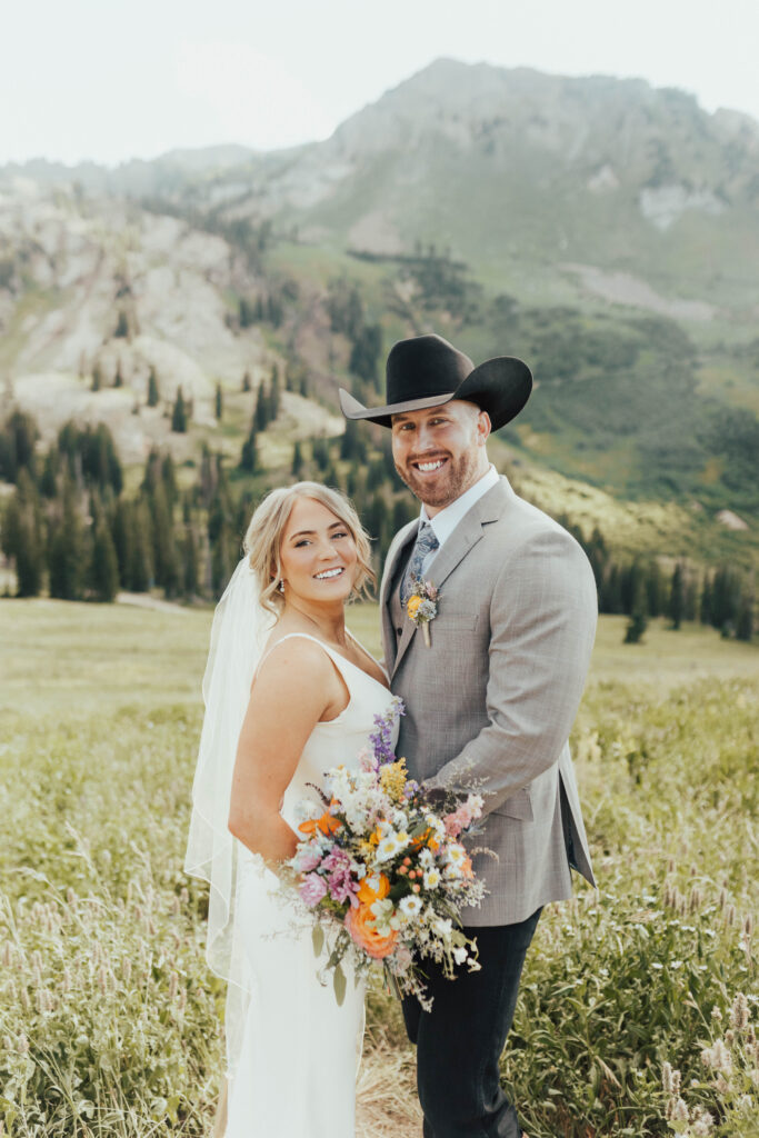 luxury mountain wedding photographer, intimate wedding venue, colorful wedding, wildflower wedding floral arrangements, western luxe groom inspiration, destination wedding photographer, timeless mountain wedding photos, couture wedding gown inspiration, elegant outdoor wedding ceremony, intimate mountain wedding ceremony, alta lodge wedding photos