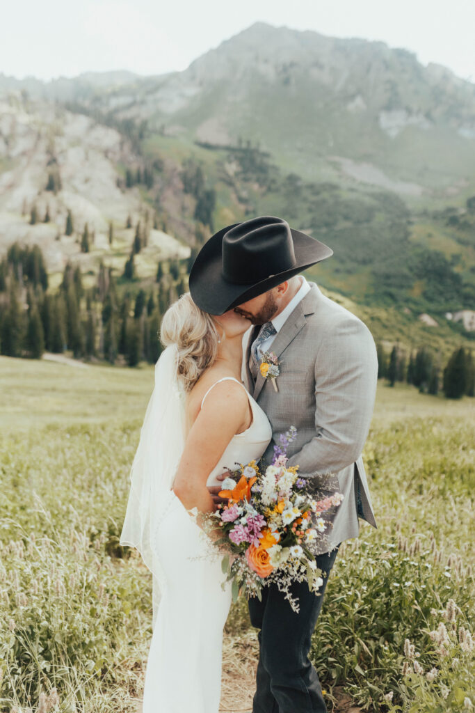 luxury mountain wedding photographer, intimate wedding venue, colorful wedding, wildflower wedding floral arrangements, western luxe groom inspiration, destination wedding photographer, timeless mountain wedding photos, couture wedding gown inspiration, elegant outdoor wedding ceremony, intimate mountain wedding ceremony, alta lodge wedding photos