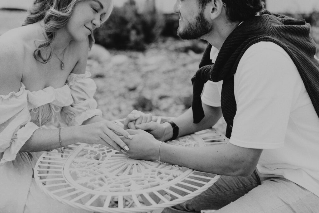 paris elopement photographer style shot with intimate café table interaction