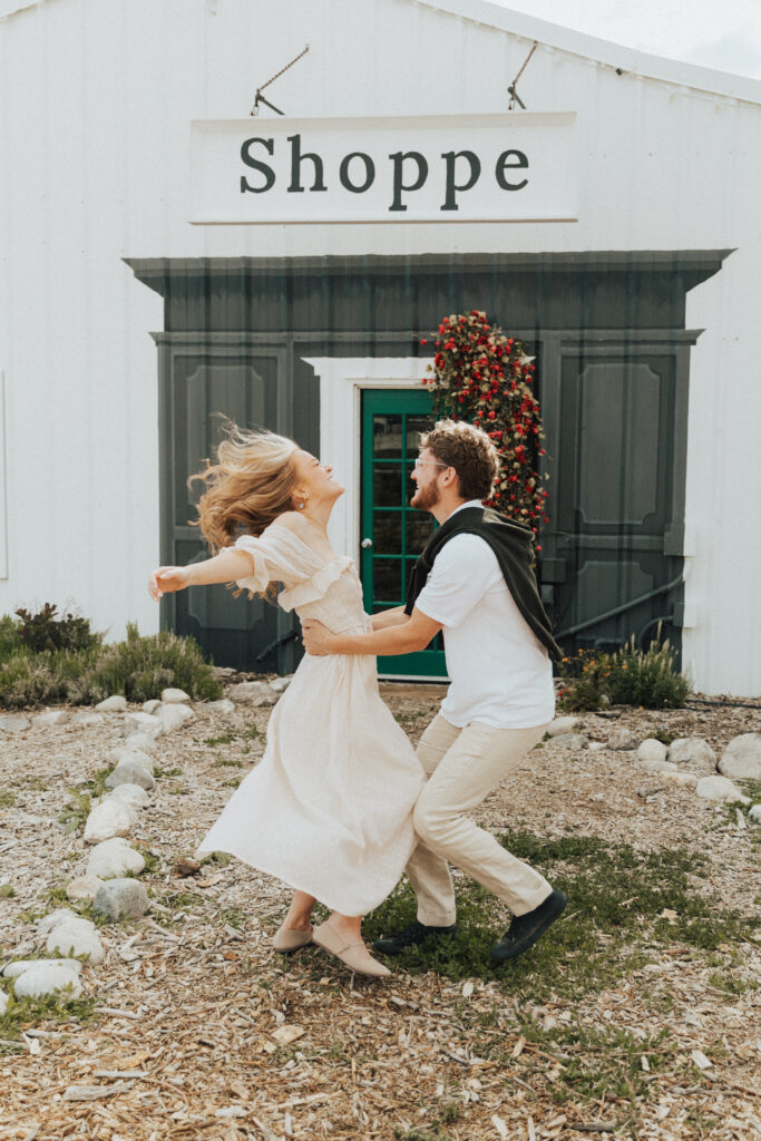 french inspired engagements posed near floral-covered doorways reminiscent of provence