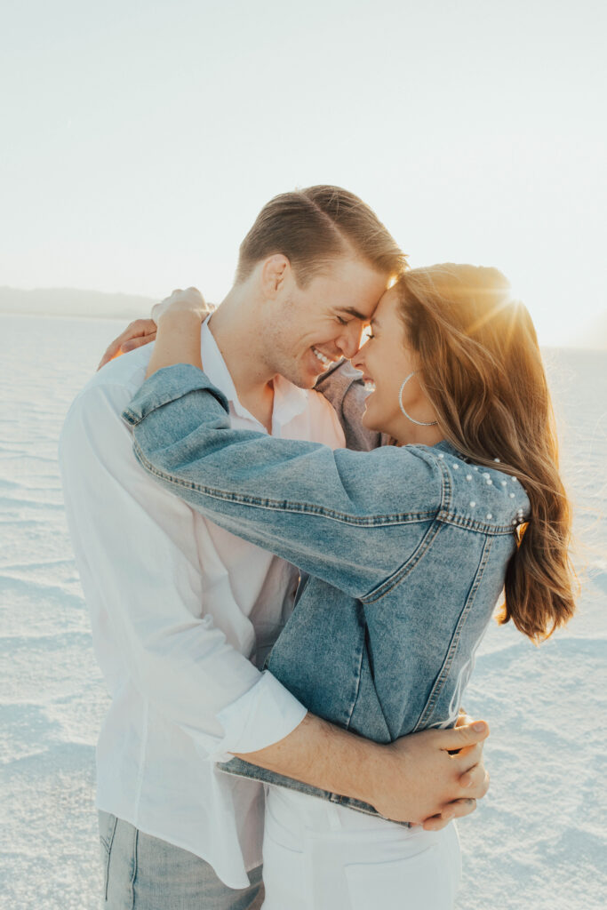 Couple sharing a forehead touch during Bonneville Salt Flats session.